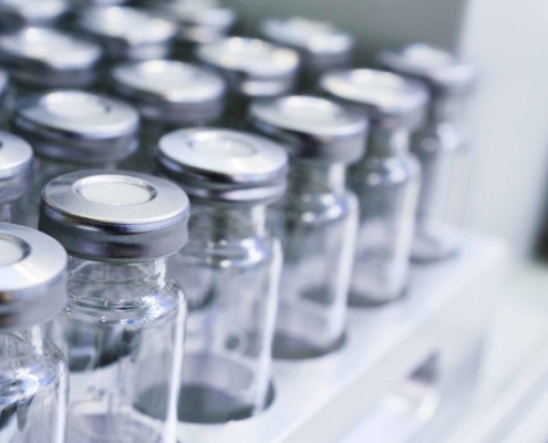 Close up view of clear glass medical bottles