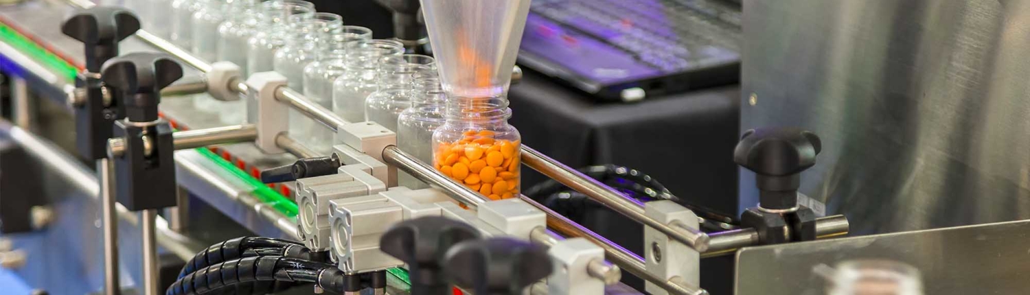 Machine filling pill bottles_november1 Machine filling pill bottles_november1