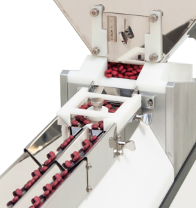 Feeder area cropped tablets in bottle filling and counting machine