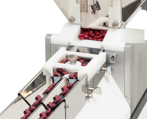 Feeder area cropped tablets in bottle filling and counting machine