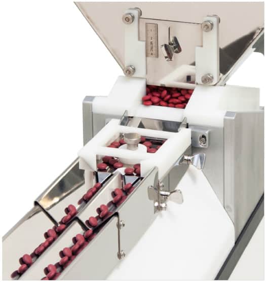 Tomcat1210 2 tablets on a bottle filling line