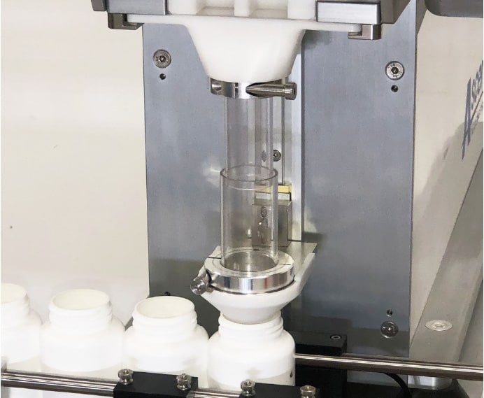 Tomcat1210 3 tomcat 1210 bottle filling machine with bottle ready to be filled with tablets