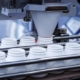 Medicine bottles being filled in factory