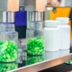 Medicine bottles being filled on assembly line in factory